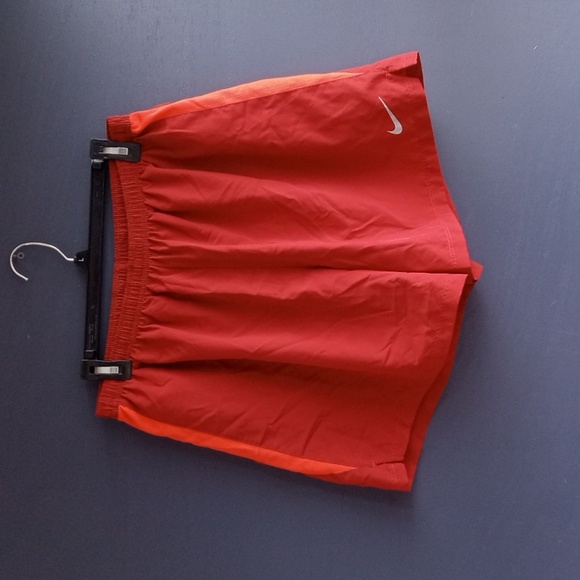 Nike Pants - Nike running Dri-Fit maroon Lined shorts with orange stripe women's XL